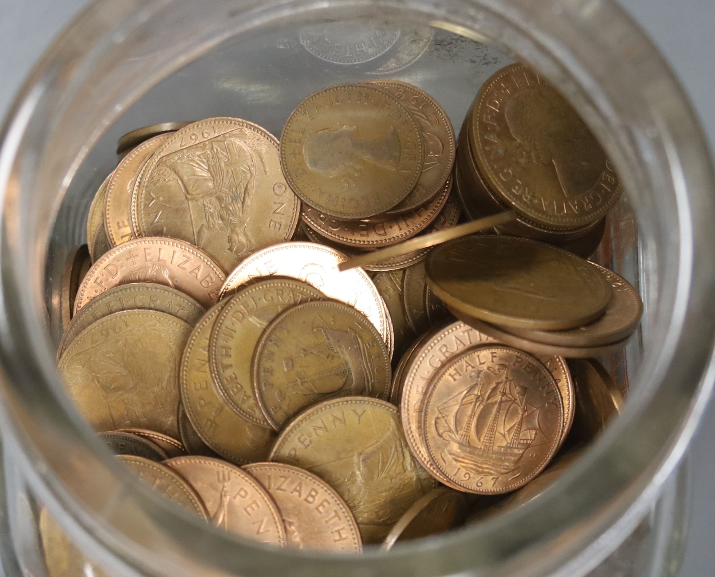 A group of UK pennies and half pennies and 20th century European coins